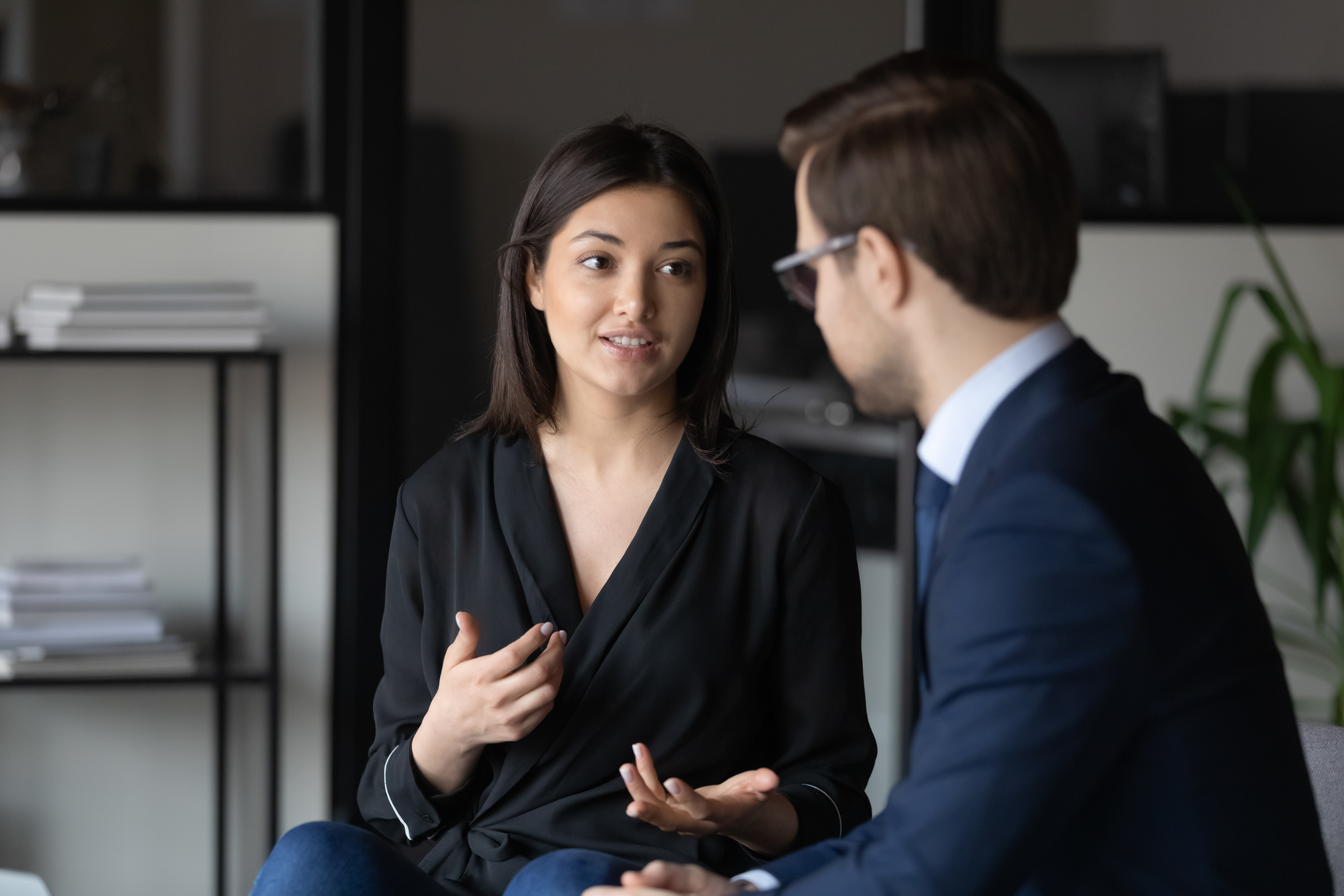 Beautiful Woman Talking To his colleague